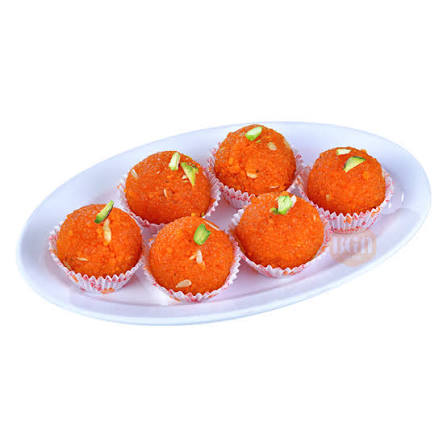 A box of golden motichoor laddus